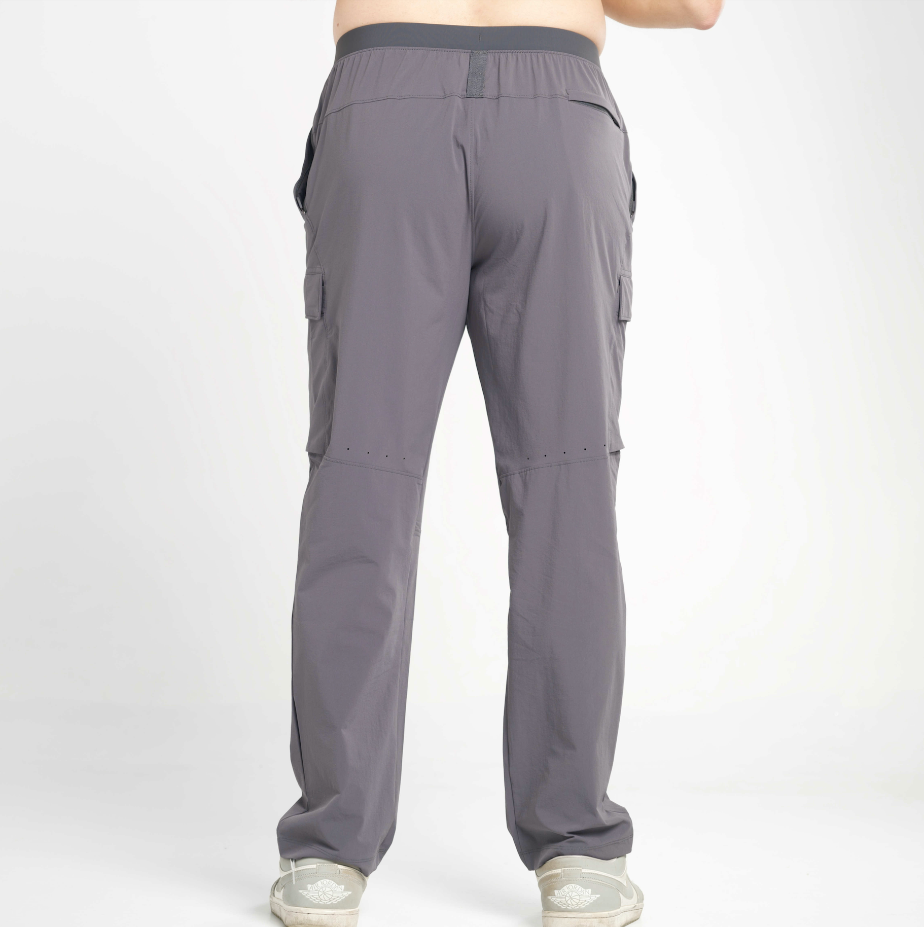 Gray cargo pants on a white background